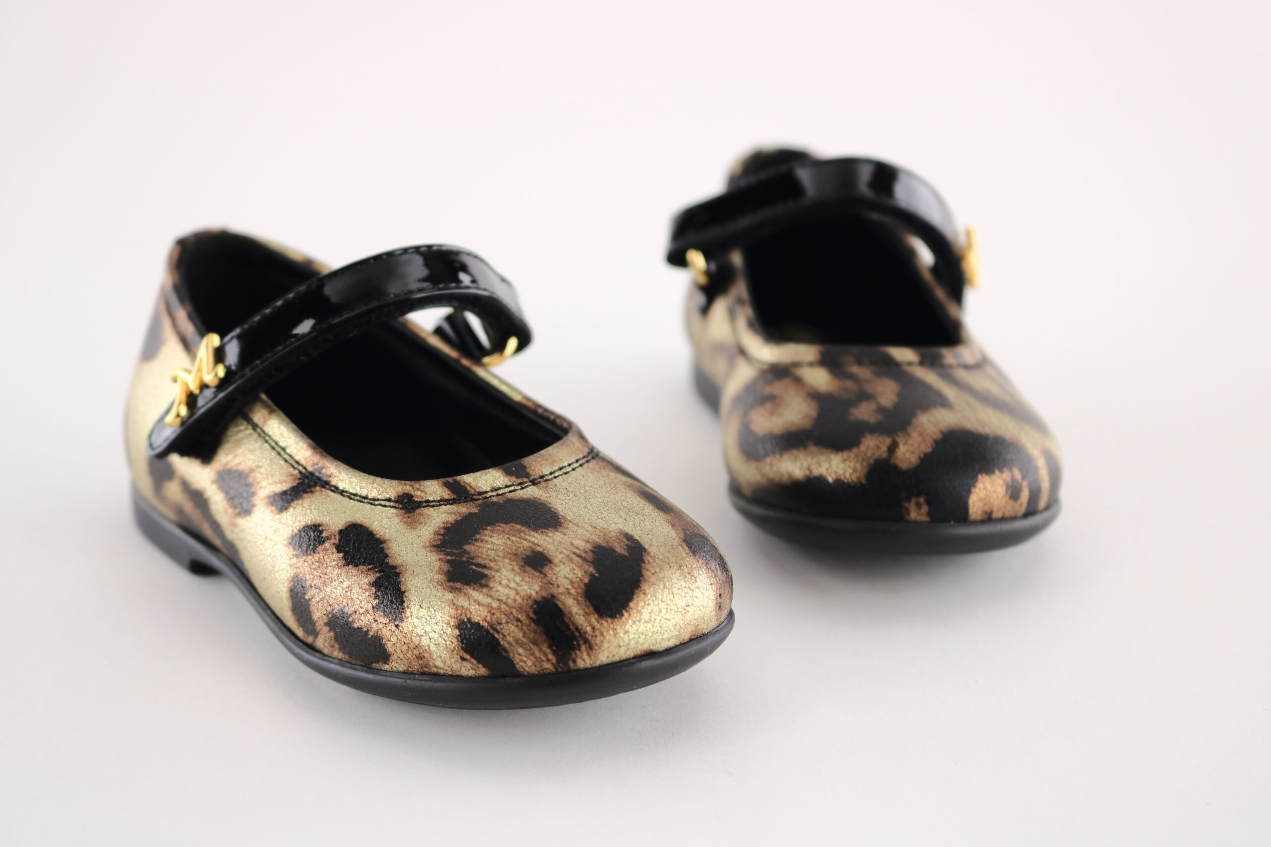 Missouri art. 2014A – Girls’ Mary Jane ballerina in metallic gold leopard-print leather with black patent strap and gold buckle.