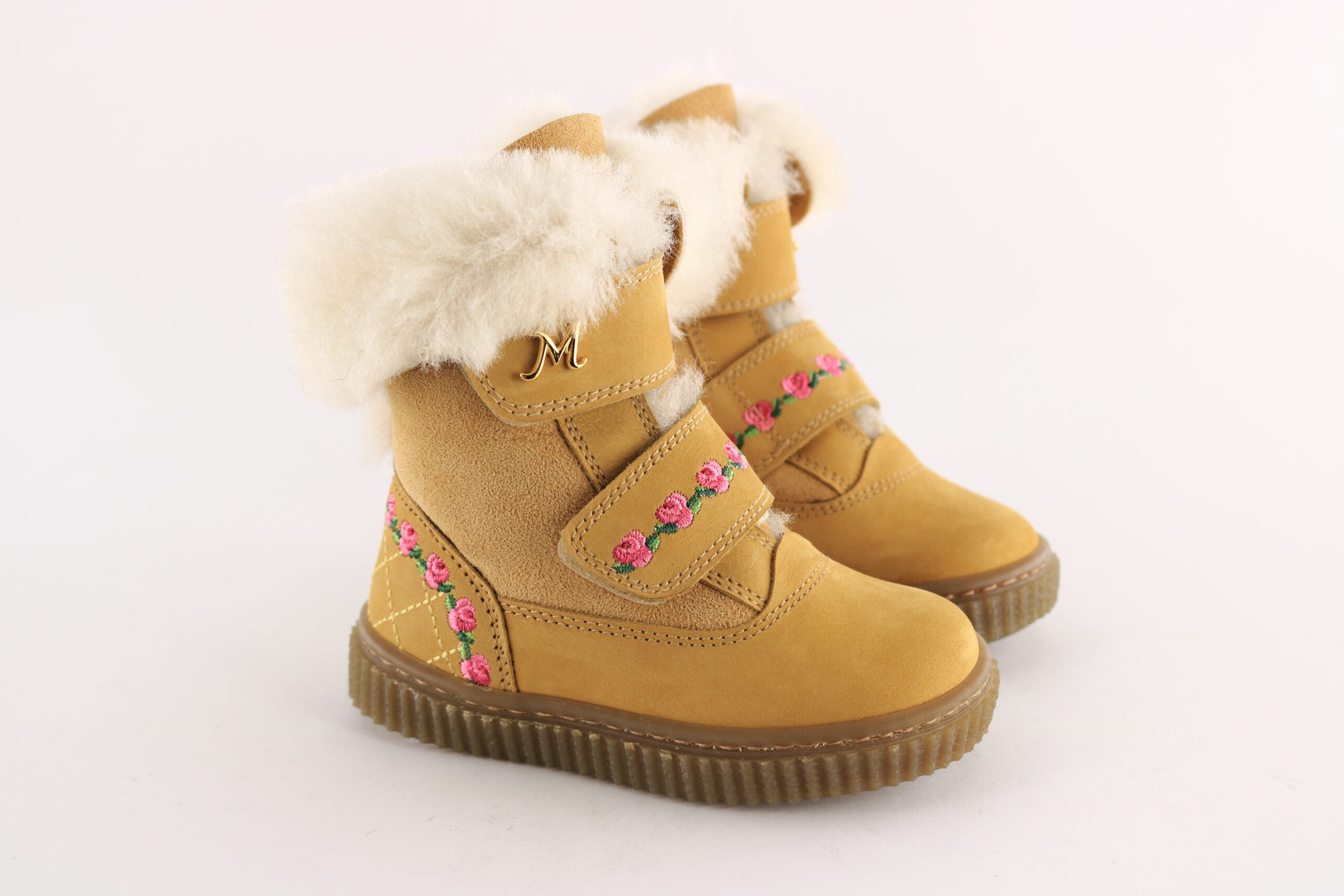 Missouri art. 2223 – Girls’ ankle boot in camel suede with faux-fur trim, floral embroidery and double velcro strap.